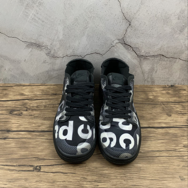 Dunk Low X Comme des Garçons Monogram Print