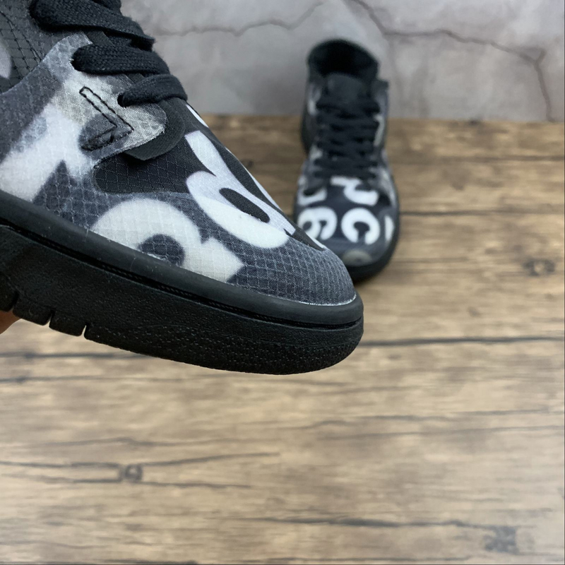 Dunk Low X Comme des Garçons Monogram Print